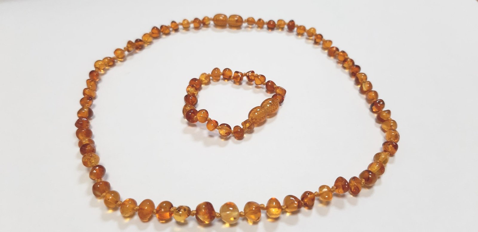 Vaikiški gintariniai rinkiniai